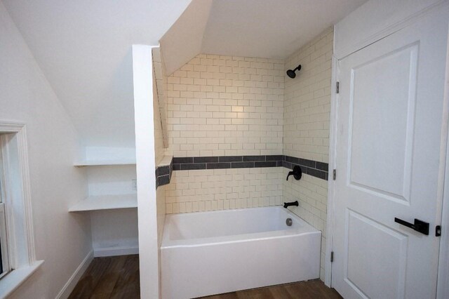 23 Highland St, Townsend, MA 01469 - full bath featuring wood finished floors, lofted ceiling, and washtub / shower combination