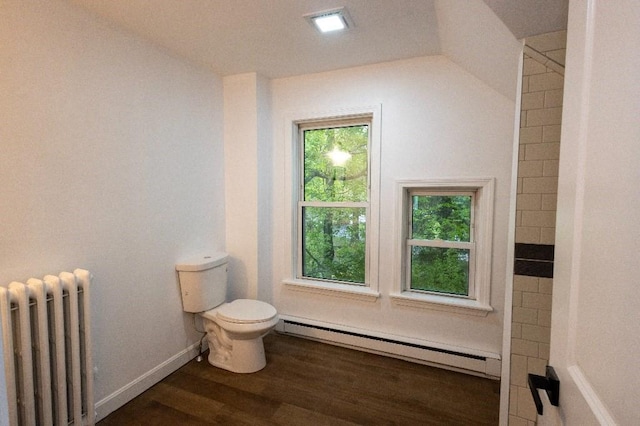 23 Highland St, Townsend, MA 01469 - bathroom with radiator, baseboard heating, toilet, wood finished floors, and baseboards