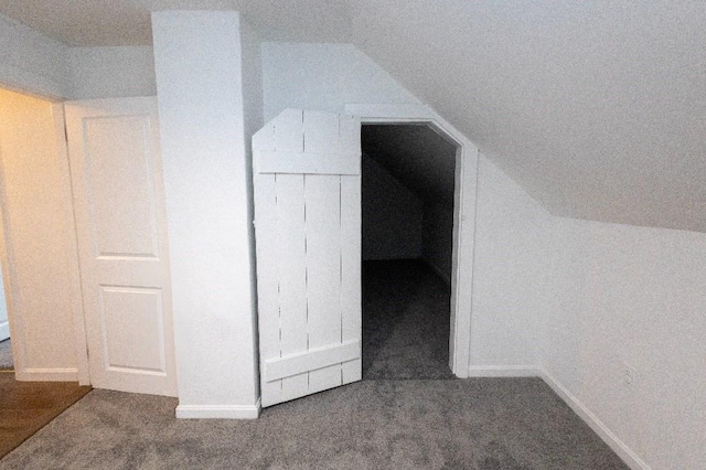 23 Highland St, Townsend, MA 01469 - bonus room featuring vaulted ceiling, baseboards, and carpet flooring