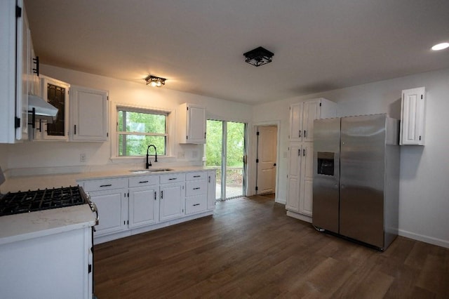 23 Highland St, Townsend, MA 01469 - kitchen with stainless steel fridge with ice dispenser, a sink, under cabinet range hood, dark wood-style floors, and recessed lighting