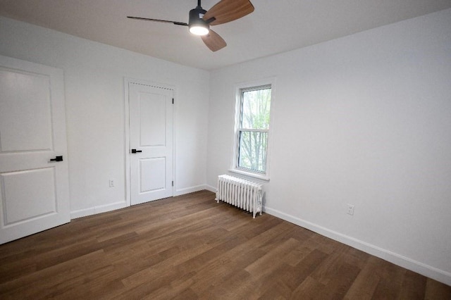 23 Highland St, Townsend, MA 01469 - unfurnished bedroom with radiator heating unit, wood finished floors, baseboards, and a ceiling fan