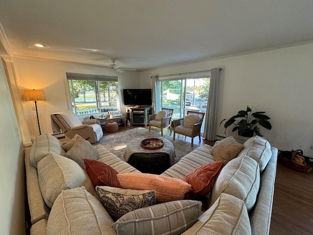 64 Edgewater Dr, Wareham, MA 02571 - living area with ornamental molding, a baseboard radiator, a ceiling fan, recessed lighting, and wood finished floors
