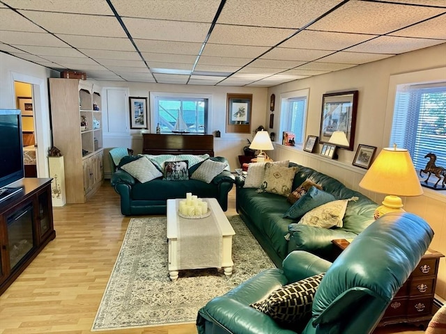64 Edgewater Dr, Wareham, MA 02571 - living area with a paneled ceiling and wood finished floors