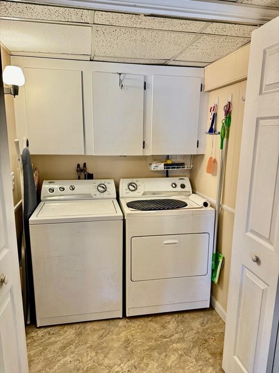 64 Edgewater Dr, Wareham, MA 02571 - clothes washing area with cabinet space and washing machine and clothes dryer