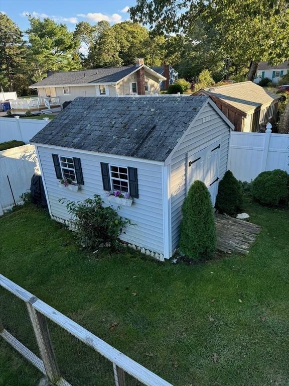 64 Edgewater Dr, Wareham, MA 02571 - view of outdoor structure featuring fence and an outdoor structure