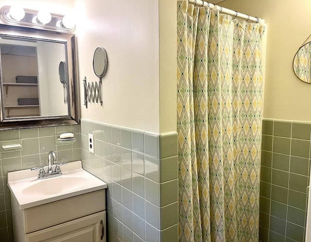 64 Edgewater Dr, Wareham, MA 02571 - full bathroom with tile walls, vanity, a wainscoted wall, and curtained shower
