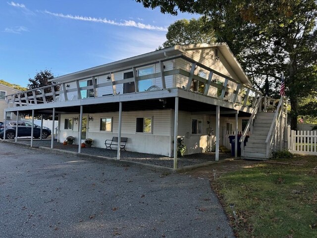 64 Edgewater Dr, Wareham, MA 02571 - view of front of house with stairway