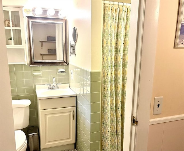 64 Edgewater Dr, Wareham, MA 02571 - bathroom with tile walls, toilet, vanity, and a shower with curtain