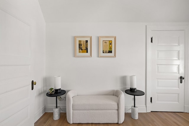 sitting room featuring light hardwood / wood-style floors