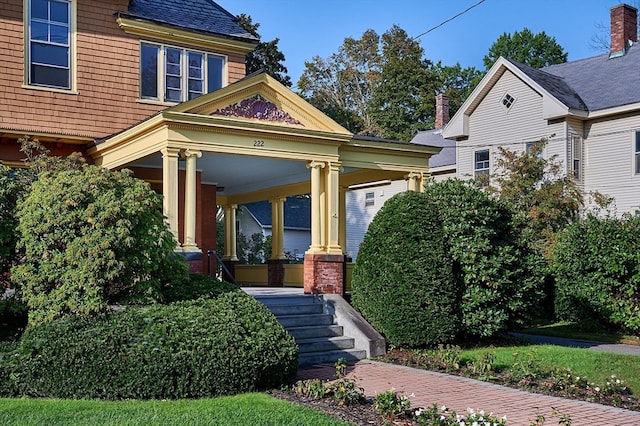 doorway to property featuring covered porch