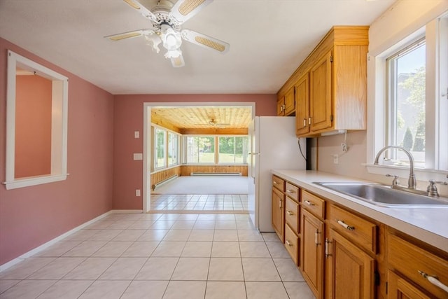 4 Cypress Rd, Natick, MA 01760 - kitchen with a sink, light countertops, ceiling fan, and freestanding refrigerator