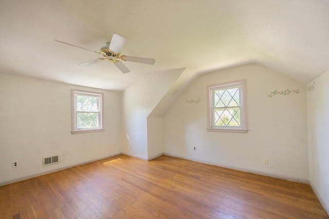 4 Cypress Rd, Natick, MA 01760 - additional living space featuring plenty of natural light, light wood-style floors, vaulted ceiling, a ceiling fan, and baseboards