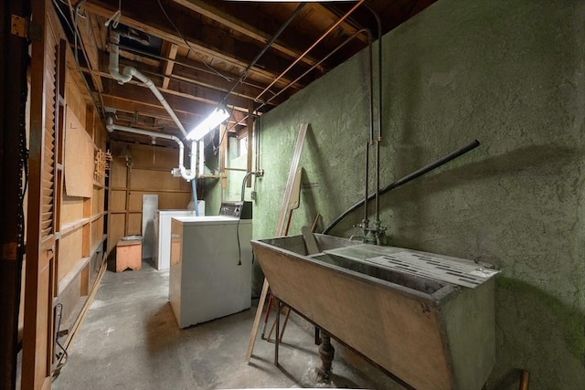 4 Cypress Rd, Natick, MA 01760 - unfinished below grade area with washer and clothes dryer and a sink