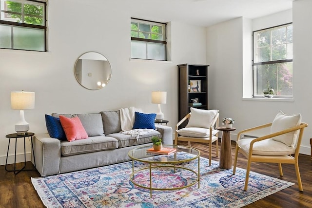 35 Nonantum St Unit E, Boston, MA 02135 - living area featuring dark wood finished floors and baseboards