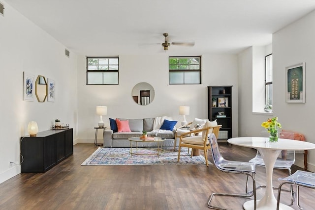 35 Nonantum St Unit E, Boston, MA 02135 - living area featuring a ceiling fan, wood finished floors, and baseboards