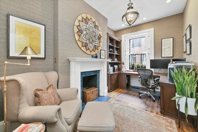 home office with dark wood-type flooring