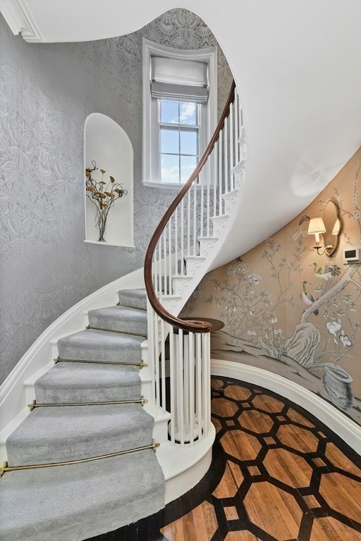 stairway featuring light wood-type flooring