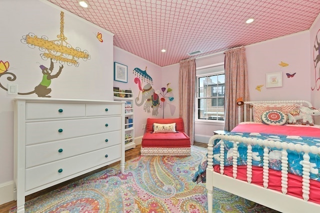 bedroom with dark wood-type flooring