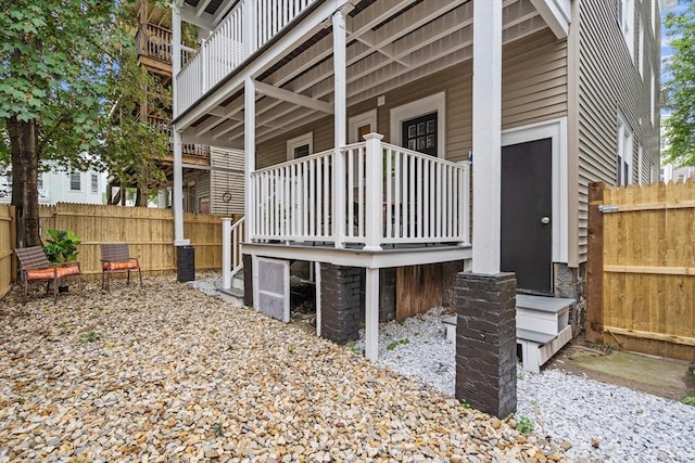 view of home's exterior featuring fence