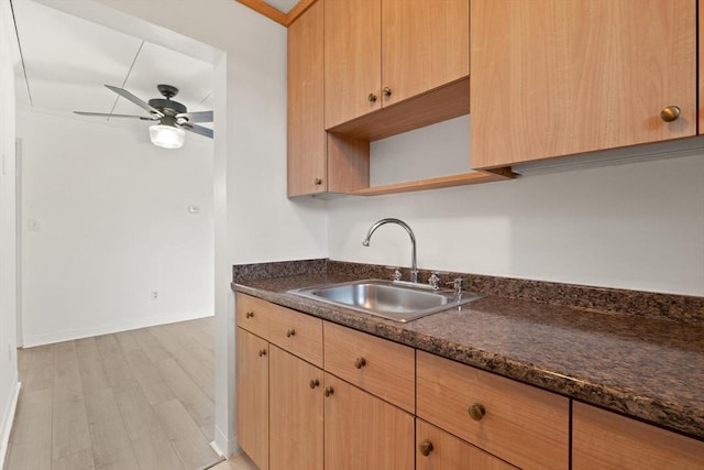 995 Massachusetts Ave Unit 301, Arlington, MA 02476 - kitchen featuring light brown cabinetry, ceiling fan, and light wood finished floors