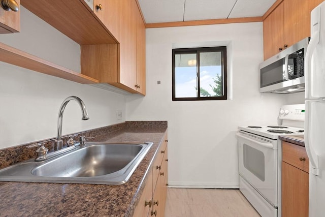 995 Massachusetts Ave Unit 301, Arlington, MA 02476 - kitchen featuring white appliances, dark countertops, open shelves, and light marble finish flooring