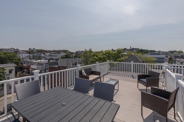 130 Tudor St Unit D, Boston, MA 02127 - wooden terrace with outdoor dining space and an outdoor living space
