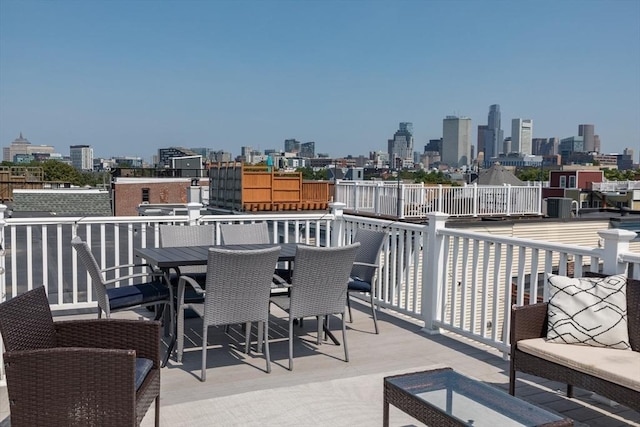 130 Tudor St Unit D, Boston, MA 02127 - view of patio / terrace with a skyline view and outdoor dining space
