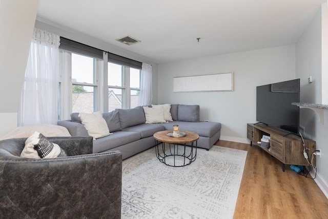 130 Tudor St Unit D, Boston, MA 02127 - living area featuring light wood finished floors and baseboards
