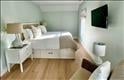 bedroom featuring light wood-type flooring