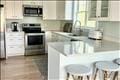 kitchen featuring white cabinets and stainless steel appliances