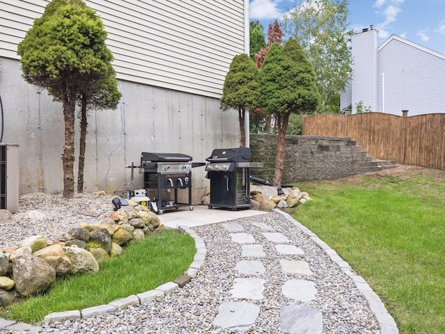 view of yard with a patio area and fence