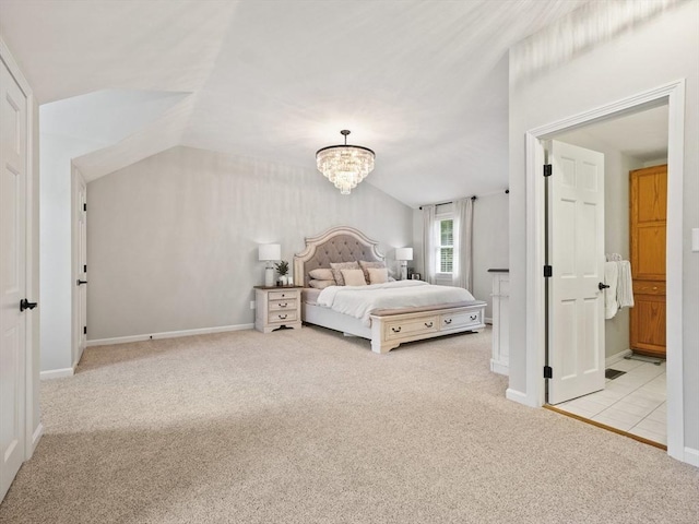 bedroom featuring vaulted ceiling, carpet flooring, baseboards, and a chandelier