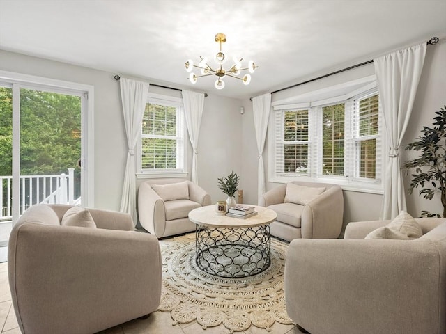 living area with a notable chandelier