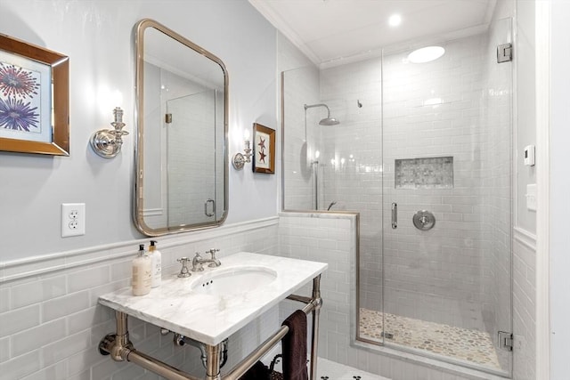 4 Cobb Ave, Manchester, MA 01944 - full bath featuring a stall shower, vanity, tile walls, and wainscoting