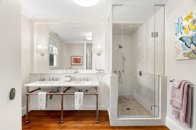 4 Cobb Ave, Manchester, MA 01944 - full bathroom featuring a shower stall, wood finished floors, and double vanity