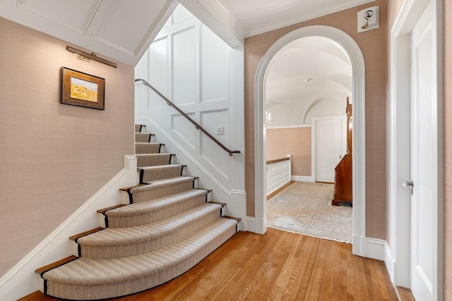 4 Cobb Ave, Manchester, MA 01944 - staircase featuring wood finished floors and crown molding