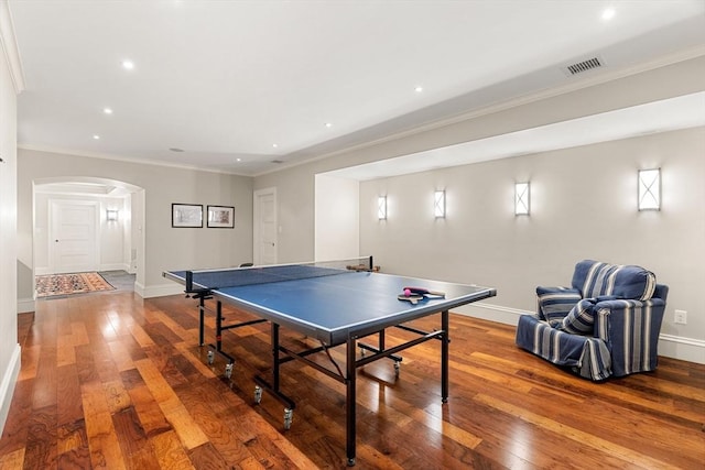 4 Cobb Ave, Manchester, MA 01944 - game room featuring arched walkways, hardwood / wood-style flooring, crown molding, and recessed lighting