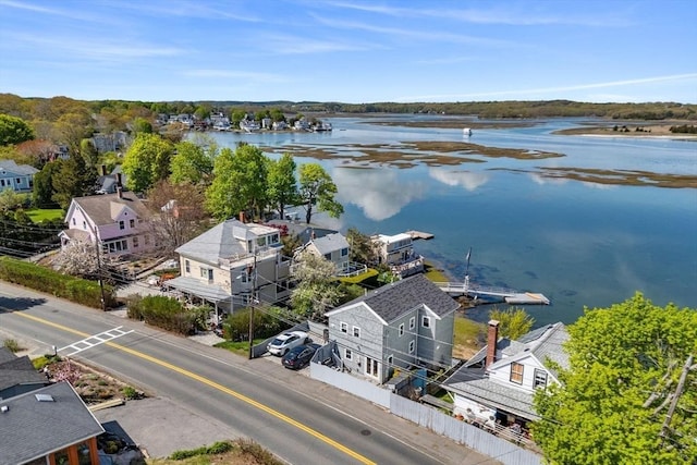 aerial view of residential area with a nearby body of water