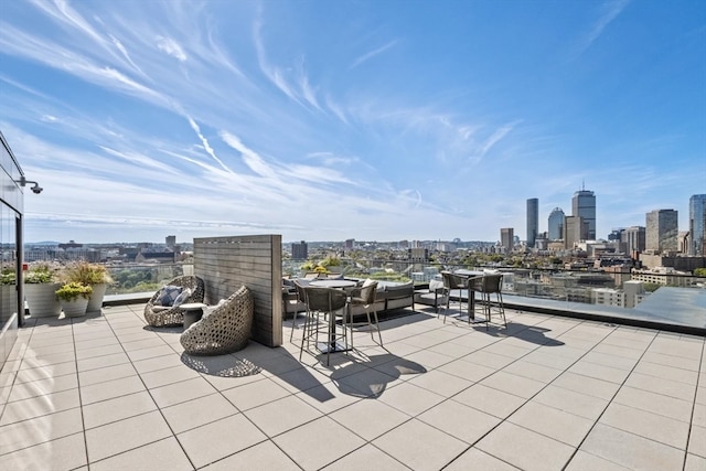 view of patio featuring a balcony