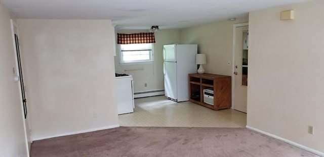 kitchen featuring washer / clothes dryer, a baseboard radiator, light carpet, and white appliances