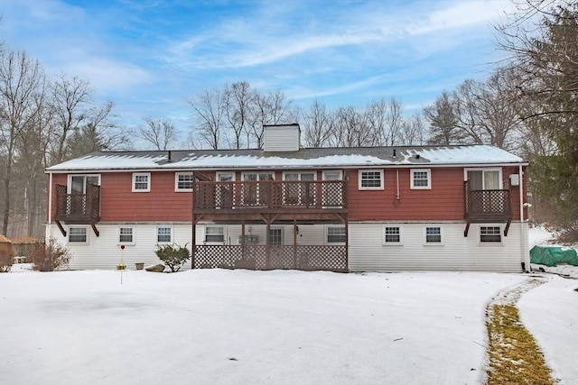 view of snow covered house