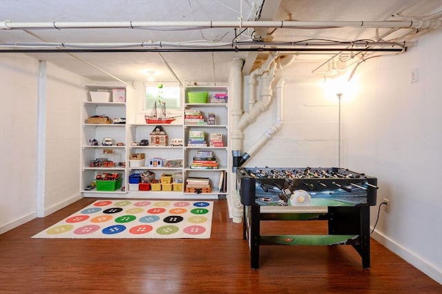 51 Rustlewood Rd, Milton, MA 02186 - playroom with wood finished floors and baseboards
