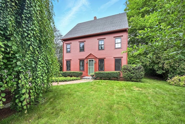 1095 Main St, Hanover, MA 02339 - view of front facade featuring a front yard, a chimney, and roof with shingles