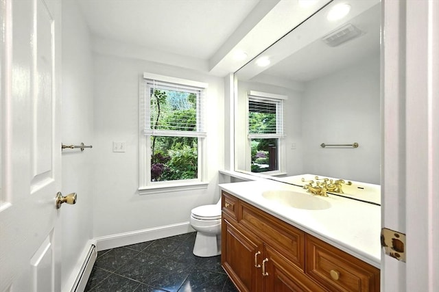 1095 Main St, Hanover, MA 02339 - bathroom featuring baseboard heating, vanity, and tile patterned flooring
