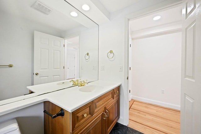 1095 Main St, Hanover, MA 02339 - bathroom featuring vanity, recessed lighting, and wood finished floors