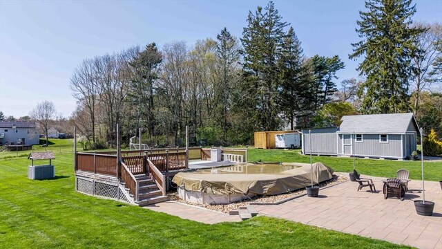 365 Middle Rd, Acushnet, MA 02743 - exterior space featuring a lawn, a deck, and a patio