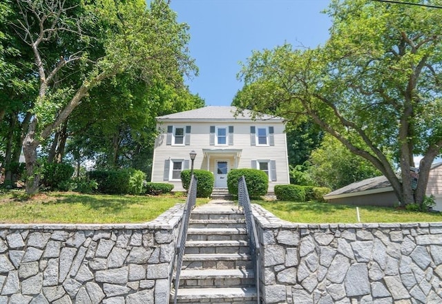 73 Sladen St, Dracut, MA 01826 - colonial house with a front lawn