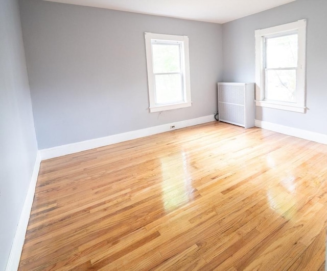 73 Sladen St, Dracut, MA 01826 - empty room with wood finished floors and baseboards