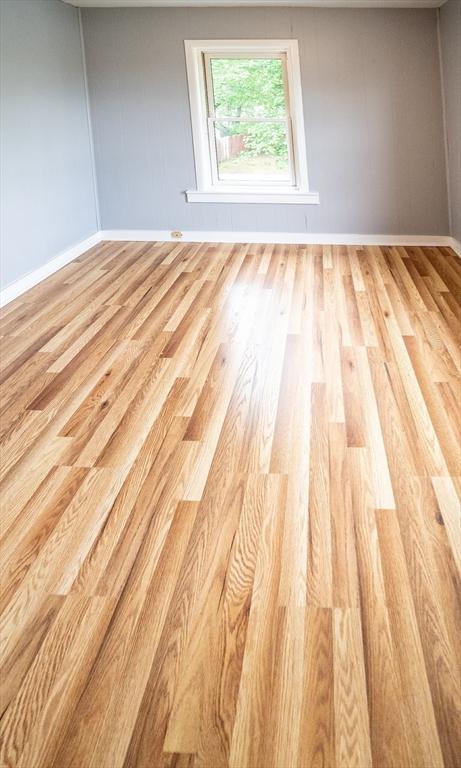 73 Sladen St, Dracut, MA 01826 - empty room featuring wood finished floors