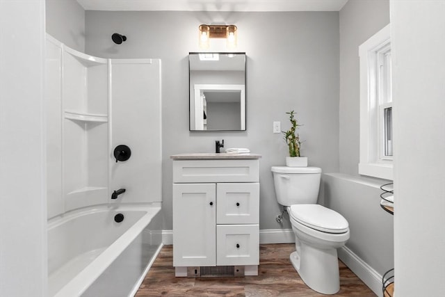 full bathroom featuring vanity, toilet, shower / bathtub combination, and wood-type flooring